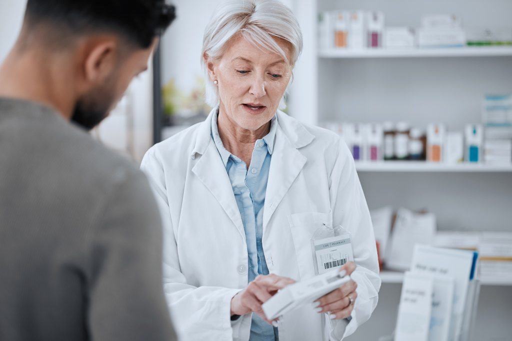 Pharmacist and customer in consultation